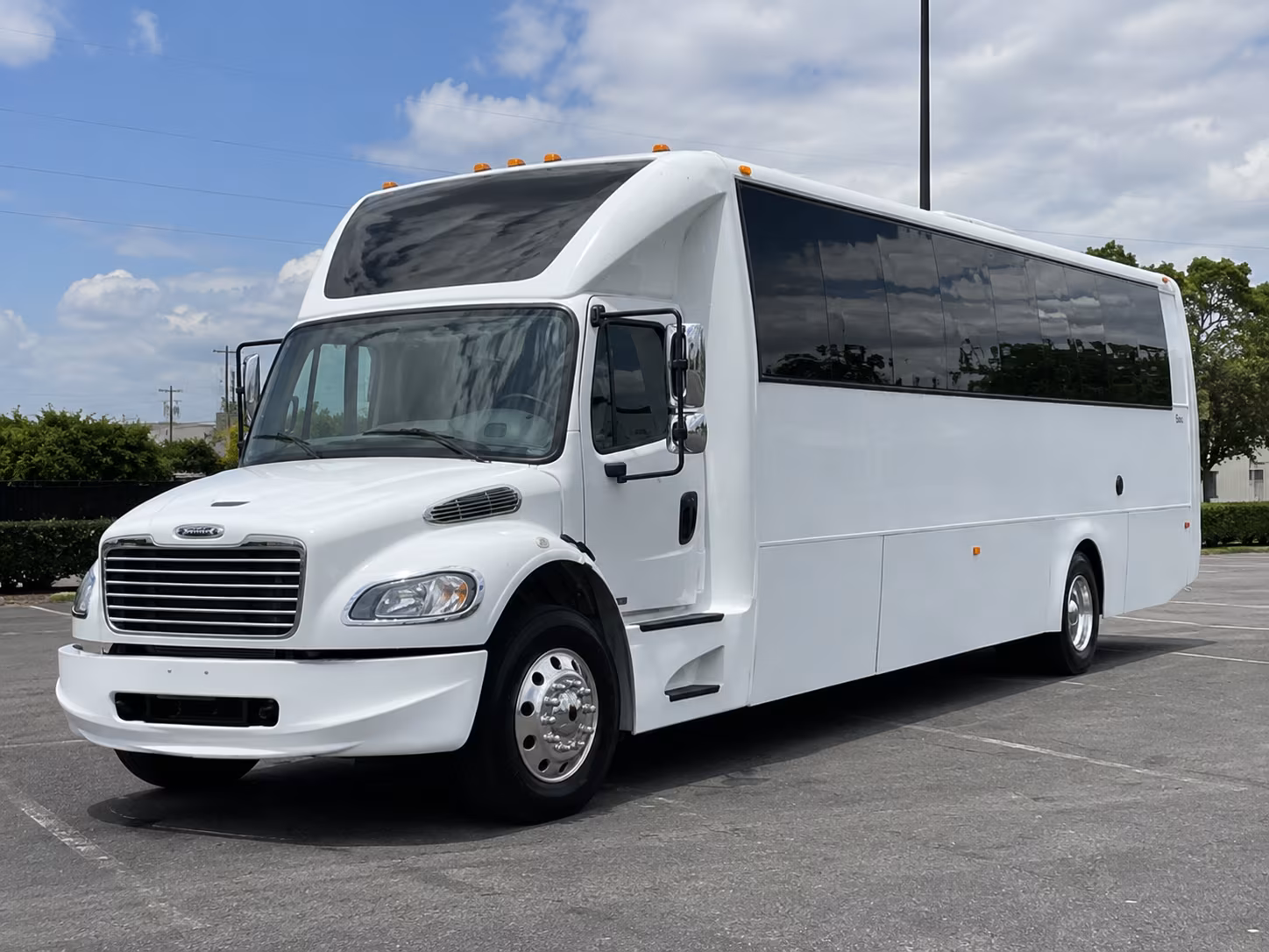 Passenger watching the Fort Myers scenery during a regional party bus road trip